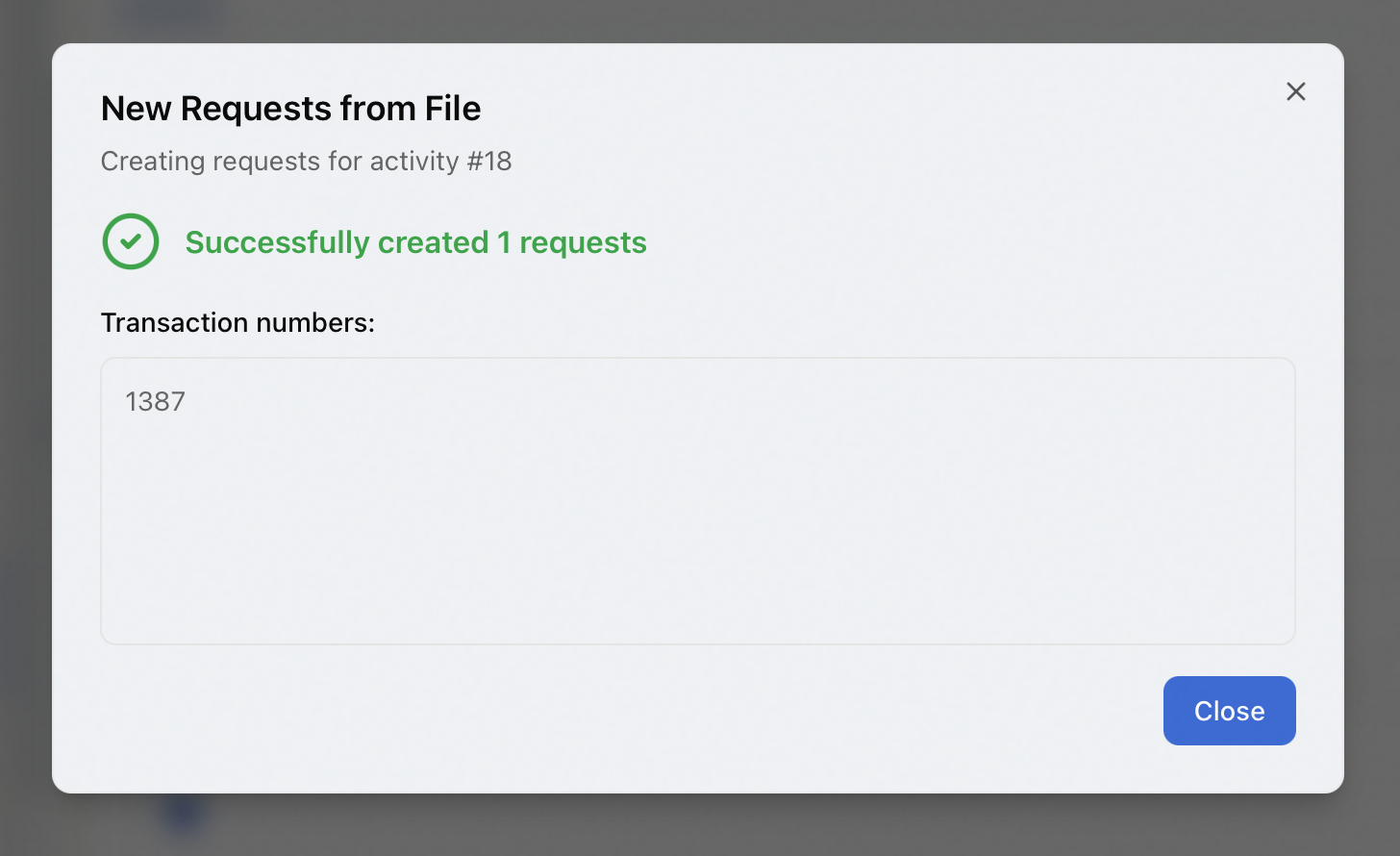 The New Requests from File success message listing the new transaction numbers