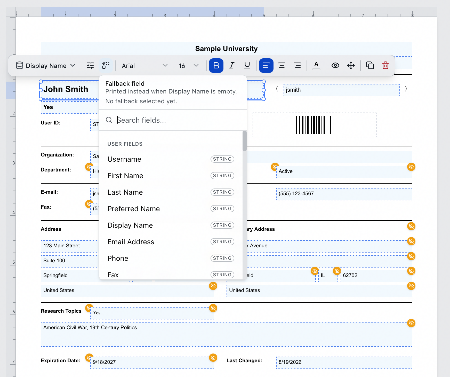 A selected Display Name field on the user card canvas with its floating toolbar above it β the field button, Format, and the fallback field button β and the Fallback field popover open, reading that the chosen field prints instead when Display Name is empty, above a searchable list of user fields