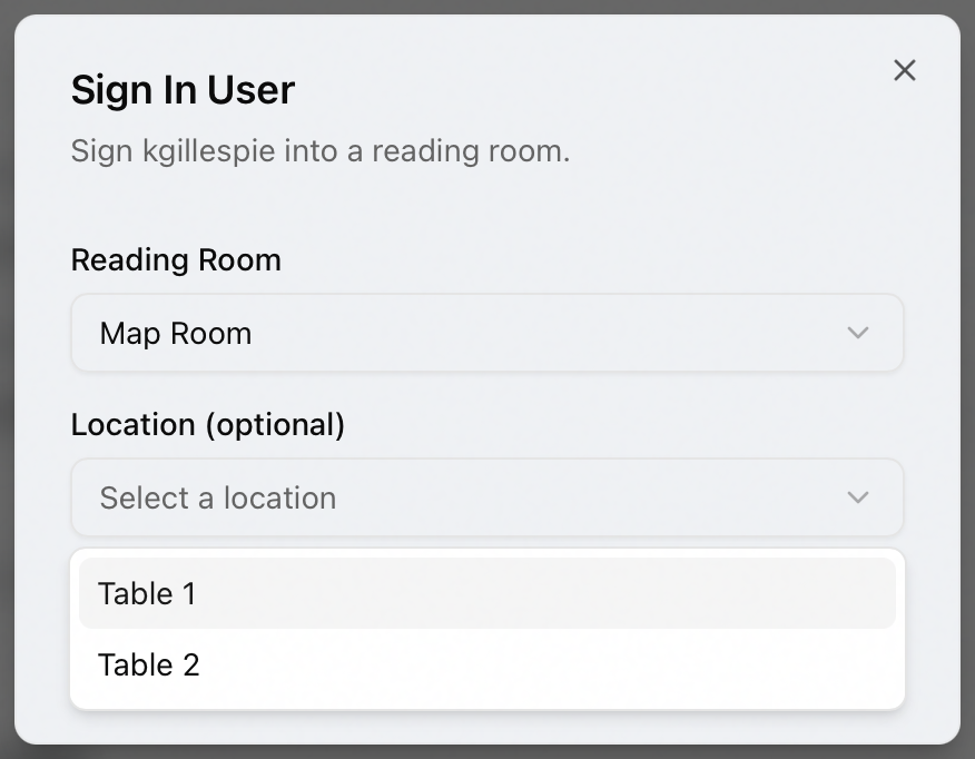 The Sign In User dialog with Map Room selected and the Location (optional) dropdown open, listing the room's seats Table 1 and Table 2