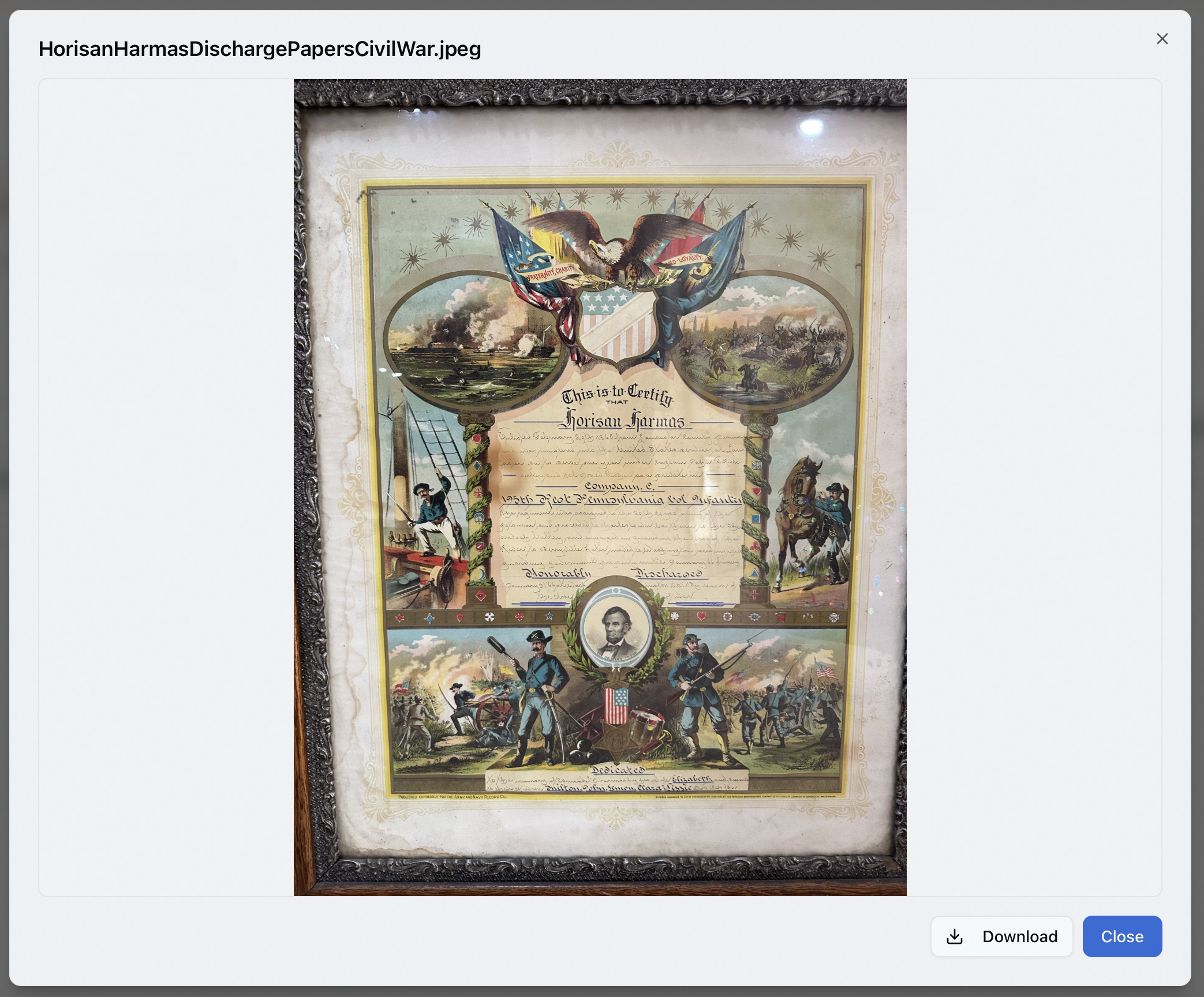 Attachment preview dialog showing an image attachment inline with Download and Close buttons