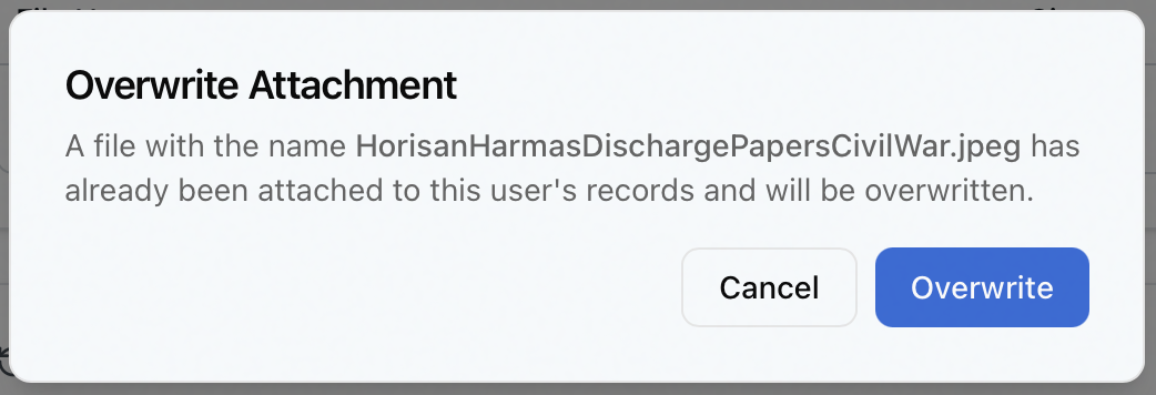 The Overwrite Attachment dialog shown when uploading a file whose name already exists on the user, with the overwrite message and Cancel and Overwrite buttons