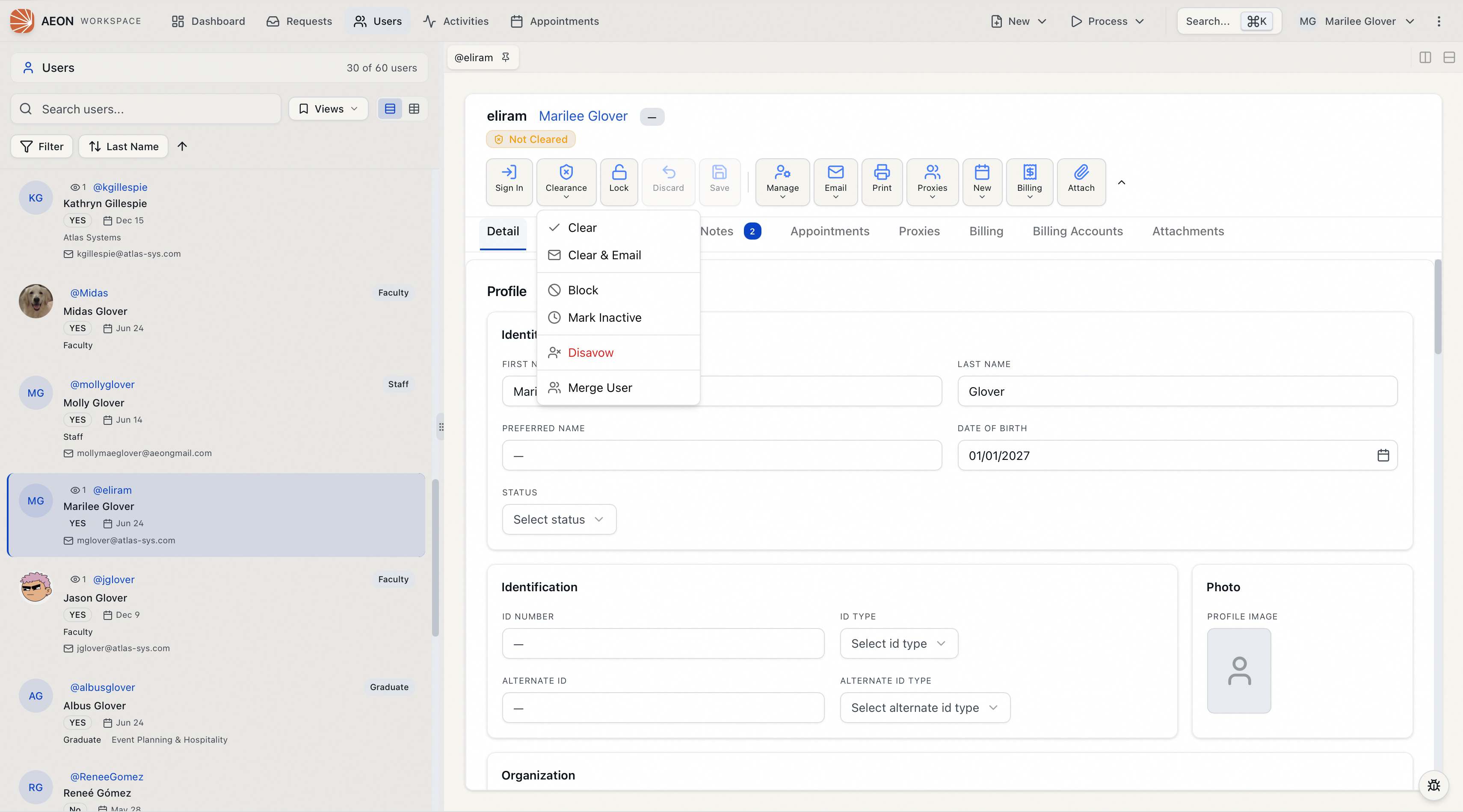 The Clearance menu open on a user record showing Clear, Clear and Email, Block, Mark Inactive, Disavow, and Merge User