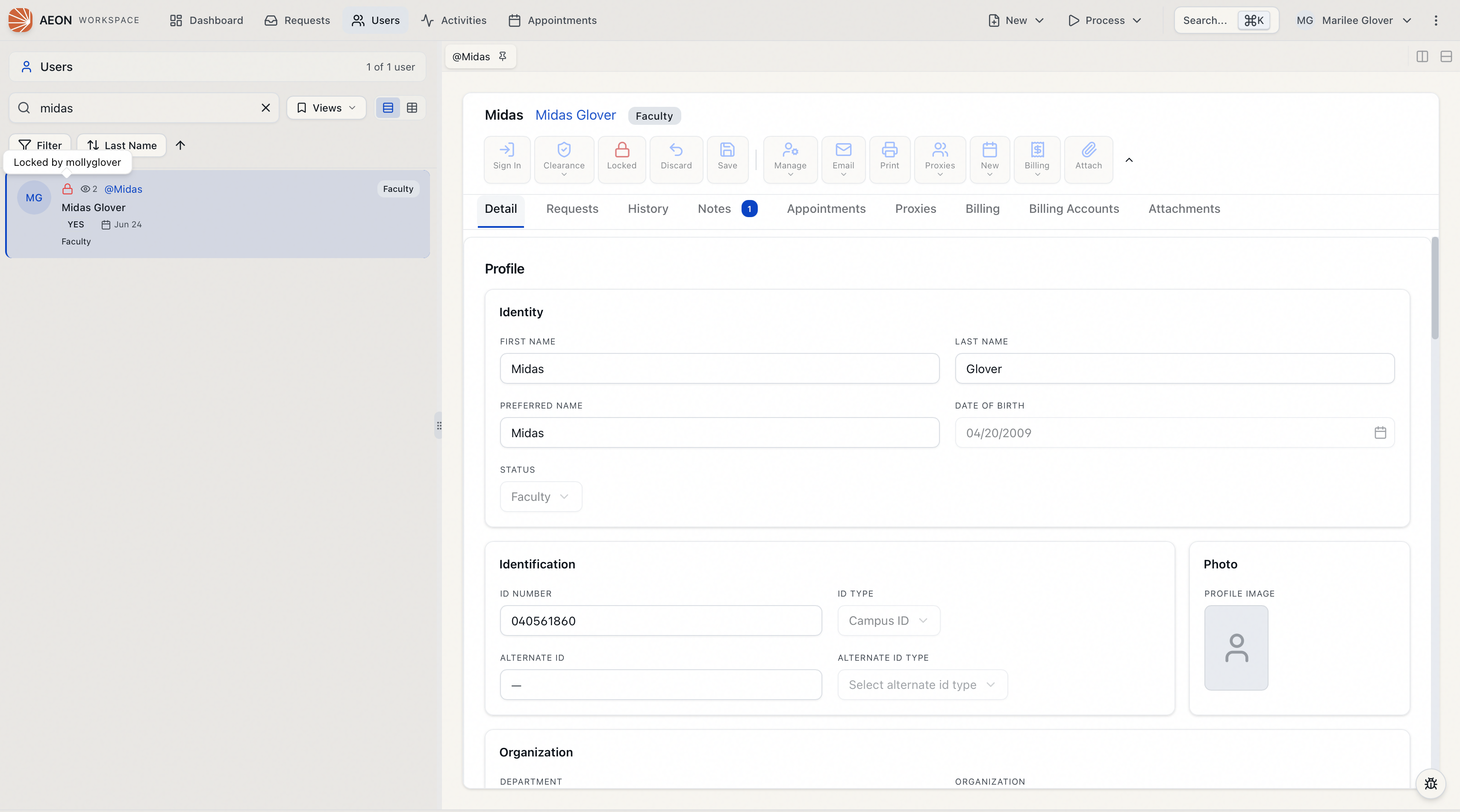 A user record locked by another staff member, shown read-only with a Locked by indicator and the editing actions disabled