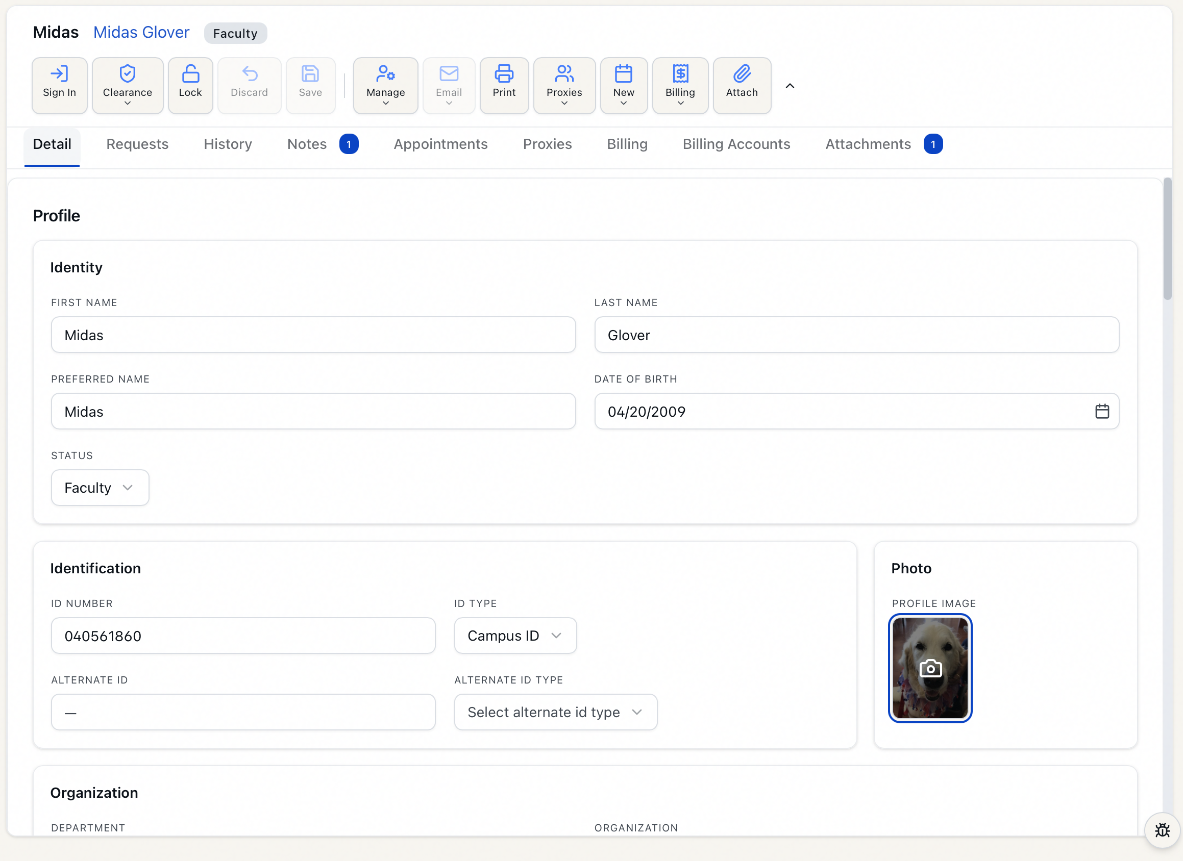 The Details section of a user record showing the profile photo thumbnail with a camera overlay indicating it is clickable